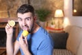 Man tasting a raw lemon Royalty Free Stock Photo