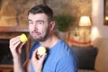 Man tasting a raw lemon Royalty Free Stock Photo