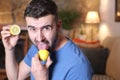 Man tasting a raw lemon Royalty Free Stock Photo