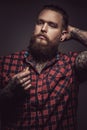 Man with tattoes and beard