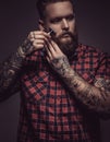 Man with tattoes and beard Royalty Free Stock Photo