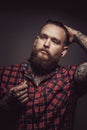 Man with tattoes and beard