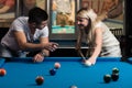 Man Teaching Woman How To Play Pool Royalty Free Stock Photo