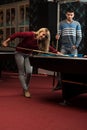 Man Teaching Woman How To Play Pool Royalty Free Stock Photo