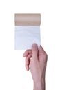 Man tears off the last sheet of toilet paper. Isolated on a white background. Royalty Free Stock Photo