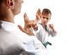 Man and teen boy fighting at aikido training in martial arts school