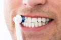 Man Teeth With Electric Toothbrush Royalty Free Stock Photo