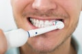 Man Teeth With Electric Toothbrush Royalty Free Stock Photo