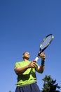 Man on Tennis Court Holding Racket Royalty Free Stock Photo