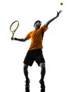 Man tennis player at service serving silhouette Royalty Free Stock Photo