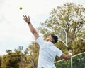 Man, tennis and serve with fitness on court and start game, sports and athlete, performance and competition. Health Royalty Free Stock Photo