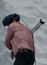 Man testing VR headset baseball experience at vive htc booth in MWC 2019 vertical Royalty Free Stock Photo