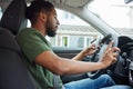 Man Texting Or Using Mobile Phone Whilst Driving Car Royalty Free Stock Photo