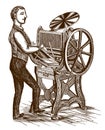 Man from the 19th century working in front of a printing press Royalty Free Stock Photo