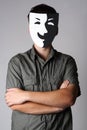 Man in theater black and white smiling mask