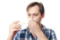 The man with the thermometer wipes snivels a scarf Royalty Free Stock Photo