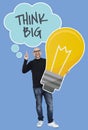 Man with Think big ideas holding a light bulb icon Royalty Free Stock Photo