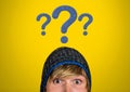 Man thinking with blue stitched question marks Royalty Free Stock Photo