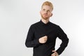 Man thinking, Red hair man serious thinking pensive portrait in studio isolated over white background, Young attractive man in Royalty Free Stock Photo