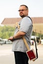 Man with a three string cigar box guitar Royalty Free Stock Photo