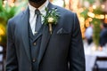 man in a threepiece suit with a boutonniere at an upscale event Royalty Free Stock Photo