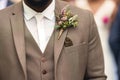 man in a threepiece suit with a boutonniere at an upscale event Royalty Free Stock Photo