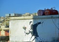 Man throwing flowers by Banksy Royalty Free Stock Photo