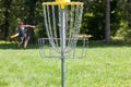 Man throwing frisbee playing disc golf
