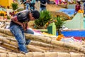 Man ties together bamboo kite frame, Giant kite festival, Santiago Sacatepequez, Guatemala Royalty Free Stock Photo