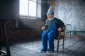 Man in tinfoil helmet and hypnotizing glasses, UFO Royalty Free Stock Photo