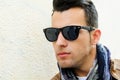 Man with tinted sunglasses in urban background Royalty Free Stock Photo