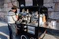 Man with a tiny coffee shop on the streets of Helsinki, Finland