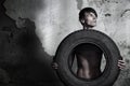 Man with tire Royalty Free Stock Photo