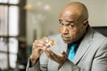 Worried man with an Opioid Prescription Bottle Royalty Free Stock Photo