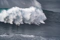 Man escaping from being wiped out by a giant wave. Royalty Free Stock Photo