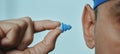 man about to put an earplug, banner format Royalty Free Stock Photo
