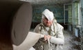 Man in toilet paper in neglected room