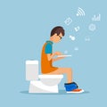 Man in the toilet room with the tablet flat style.