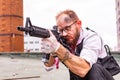 Man took aim with the pistol. Action Movie Style Royalty Free Stock Photo