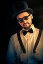 Man with Top Hat and Steampunk Glasses Retro Portrait
