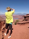 Man at the top of the mountain at Dead Horse Point