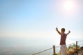 Man on top of a mountain looking for horizon