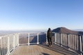 Man at the top of a mountain