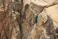 Man Top Rock Climbing a Hoodoo in Arizona Royalty Free Stock Photo