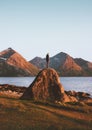 Man on the top of rock enjoying sunset landscape travel in Norway outdoor active healthy lifestyle adventure vacations Royalty Free Stock Photo