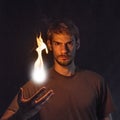 Man Tossing Fire Ball Royalty Free Stock Photo