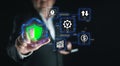 Man touch glowing security shield protecting digital data and computer systems from cyber threats Royalty Free Stock Photo