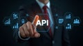 Man touching API hexagonal button symbolizing digital transformation and software integration showcasing futuristic technology and Royalty Free Stock Photo