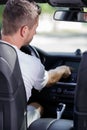 man touching car dashboard Royalty Free Stock Photo