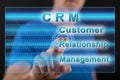Man touching a crm concept on a touch screen Royalty Free Stock Photo